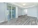 Spacious bedroom with access to tiled private balcony at 2001 Bal Harbor Blvd # 2202, Punta Gorda, FL 33950