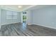 Bedroom with lots of natural light from windows and sliding glass door at 2001 Bal Harbor Blvd # 2202, Punta Gorda, FL 33950