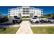 Front view of condominium with well manicured landscaping and convenient parking at 2001 Bal Harbor Blvd # 2202, Punta Gorda, FL 33950