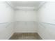 Walk-in closet with metal shelving at 2001 Bal Harbor Blvd # 2202, Punta Gorda, FL 33950