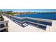 Charming dock featuring a waterfront view of beautiful blue water, set against a bright blue sky at 2001 Bal Harbor Blvd # 2202, Punta Gorda, FL 33950