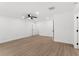 Bright bedroom with modern ceiling fan, and plenty of closet space at 2027 59Th N St, Clearwater, FL 33760