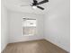 This is a bedroom that shows wood-look flooring, window and neutral color scheme for relaxation at 2027 59Th N St, Clearwater, FL 33760