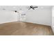 Spacious living room with hardwood floors, recessed lighting, and ample natural light at 2027 59Th N St, Clearwater, FL 33760