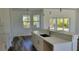 Kitchen featuring stone countertops, undermount sink, and stainless steel faucet at 23458 Macbeth Ct, Punta Gorda, FL 33980
