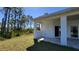 View of the porch which includes tile flooring and support columns at 23458 Macbeth Ct, Punta Gorda, FL 33980