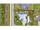 Aerial view of a beautiful home with a private pool, lush greenery, and RV parking at 23531 Dunstan Ave, Port Charlotte, FL 33954