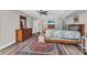 Spacious main bedroom with wood-look floors, ceiling fan, and ensuite bathroom at 23531 Dunstan Ave, Port Charlotte, FL 33954