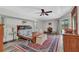 The main bedroom boasts wood-look floors and sliding doors that provides private access to the pool area at 23531 Dunstan Ave, Port Charlotte, FL 33954