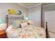 Comfortable bedroom with closet and seashell-themed decor at 2436 Arugula Dr, North Port, FL 34289