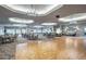 Spacious event space with dance floor, tables and chairs for gatherings or celebrations at 2436 Arugula Dr, North Port, FL 34289