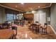 Game room with tables, chairs, and counter with a window overlooking the grounds at 2436 Arugula Dr, North Port, FL 34289