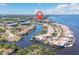 Stunning aerial view of waterfront condos and surrounding neighborhood with beautiful canal access at 25188 Marion Ave # E306, Punta Gorda, FL 33950