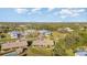 Expansive aerial view showcasing the villa's community, set amongst a lush landscape at 26169 Explorer Rd # 7P, Punta Gorda, FL 33983