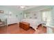 Bright bedroom with a bed with decorative pillows, and a classic wooden chest at 26169 Explorer Rd # 7P, Punta Gorda, FL 33983