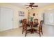 Cozy dining room with seating for four, a wine rack, and easy kitchen access at 26169 Explorer Rd # 7P, Punta Gorda, FL 33983