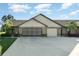 Charming single-story villa with attached two-car garage, neutral paint and manicured landscaping at 26169 Explorer Rd # 7P, Punta Gorda, FL 33983
