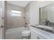 Bright bathroom with tub/shower combo and granite vanity at 2740 Boyd Ave, North Port, FL 34286