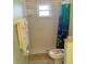 Standard bathroom featuring a shower stall with a charming ocean-themed shower curtain at 293 Broadmoor Ln, Rotonda West, FL 33947