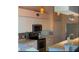 Bright kitchen featuring white cabinets, modern appliances, and stylish backsplash at 293 Broadmoor Ln, Rotonda West, FL 33947