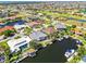 Stunning aerial view of a waterfront property with a private dock and access to canals, perfect for boating enthusiasts at 3812 Carupano Ct, Punta Gorda, FL 33950