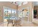 Bright breakfast nook with views of the pool, patio, and canal at 3812 Carupano Ct, Punta Gorda, FL 33950