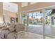 Comfortable living room with sliding doors to the patio with pool views at 3812 Carupano Ct, Punta Gorda, FL 33950