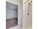 Tiled shower and view of a bedroom with neutral carpet at 4221 Circleville St, North Port, FL 34286