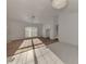 Bright living room featuring carpet, tile flooring, and a ceiling fan at 4221 Circleville St, North Port, FL 34286