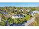 Aerial view of the house showing the yard and street at 4501 Midland St, North Port, FL 34288