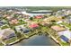 Picturesque waterfront community with beautiful homes, private boat docks, and lush tropical landscaping at 480 Macedonia Dr, Punta Gorda, FL 33950