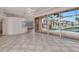 Inviting living room with sliding glass doors to the patio and pool at 480 Macedonia Dr, Punta Gorda, FL 33950