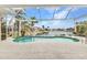 Screened-in pool with canal view featuring a serene backyard oasis and providing a private and relaxing outdoor space at 480 Macedonia Dr, Punta Gorda, FL 33950