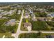Aerial view of a home in a quiet neighborhood showcasing the home's location at 7014 Baylor Street, Englewood, FL 34224