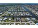 Expansive aerial view highlighting a waterfront community with canal access, showcasing the residential area at 721 Dania Ct, Punta Gorda, FL 33950