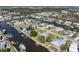 Picturesque aerial view of waterfront community home and canal front living at 721 Dania Ct, Punta Gorda, FL 33950