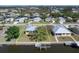 Aerial view of waterfront home and property with boat dock and canal access at 721 Dania Ct, Punta Gorda, FL 33950