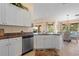 Well-equipped kitchen with modern appliances and convenient access to dining area and water views at 721 Dania Ct, Punta Gorda, FL 33950