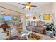 Comfortable living room featuring tiled floors and a view of the backyard at 721 Dania Ct, Punta Gorda, FL 33950