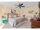 Comfortable main bedroom with soft lighting, stylish decor, and a relaxing ambiance at 721 Dania Ct, Punta Gorda, FL 33950