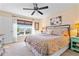 Serene main bedroom featuring water views, soft carpet, and elegant furnishings at 721 Dania Ct, Punta Gorda, FL 33950