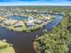 Waterfront property with a private dock and easy access to boating and recreational water activities at 8774 Mystic Cir, North Port, FL 34287