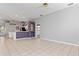 Open-concept living area with easy access to the kitchen and other rooms at 8774 Mystic Cir, North Port, FL 34287