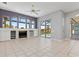 Bright living area with sliding glass doors leading to the pool, and custom built-ins at 8774 Mystic Cir, North Port, FL 34287
