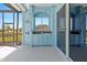 This patio features a built-in kitchenette and offers ample space for outdoor living and entertaining at 8774 Mystic Cir, North Port, FL 34287