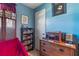 Relaxing bedroom featuring a vintage stereo, decor, and ample storage at 1060 Venetian Pkwy, Venice, FL 34285
