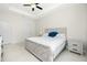 Spacious bedroom with tray ceilings, neutral colors, and a comfortable atmosphere at 1384 Alpinia Rd, North Port, FL 34288