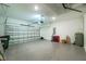 Spacious garage features high ceilings and plenty of room for storage at 1384 Alpinia Rd, North Port, FL 34288