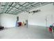 Garage featuring high ceilings and room for storage at 1384 Alpinia Rd, North Port, FL 34288