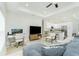 Bright and open floor plan connecting the living area, kitchen, and a dedicated workspace at 1384 Alpinia Rd, North Port, FL 34288